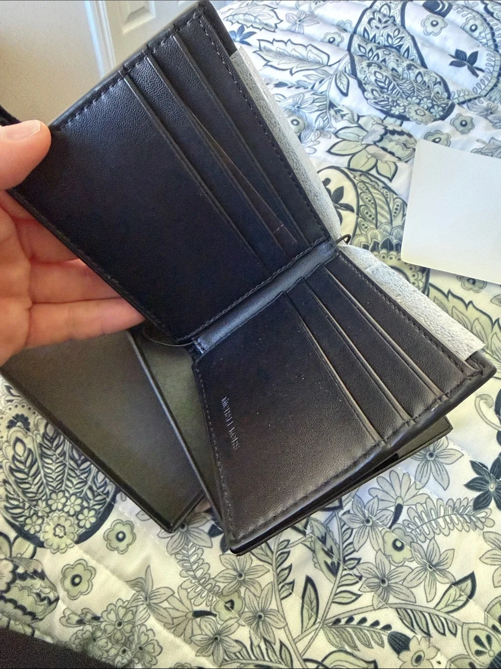 Michael Kors Black Slim Leather Billfold Wallet with Embossed MK